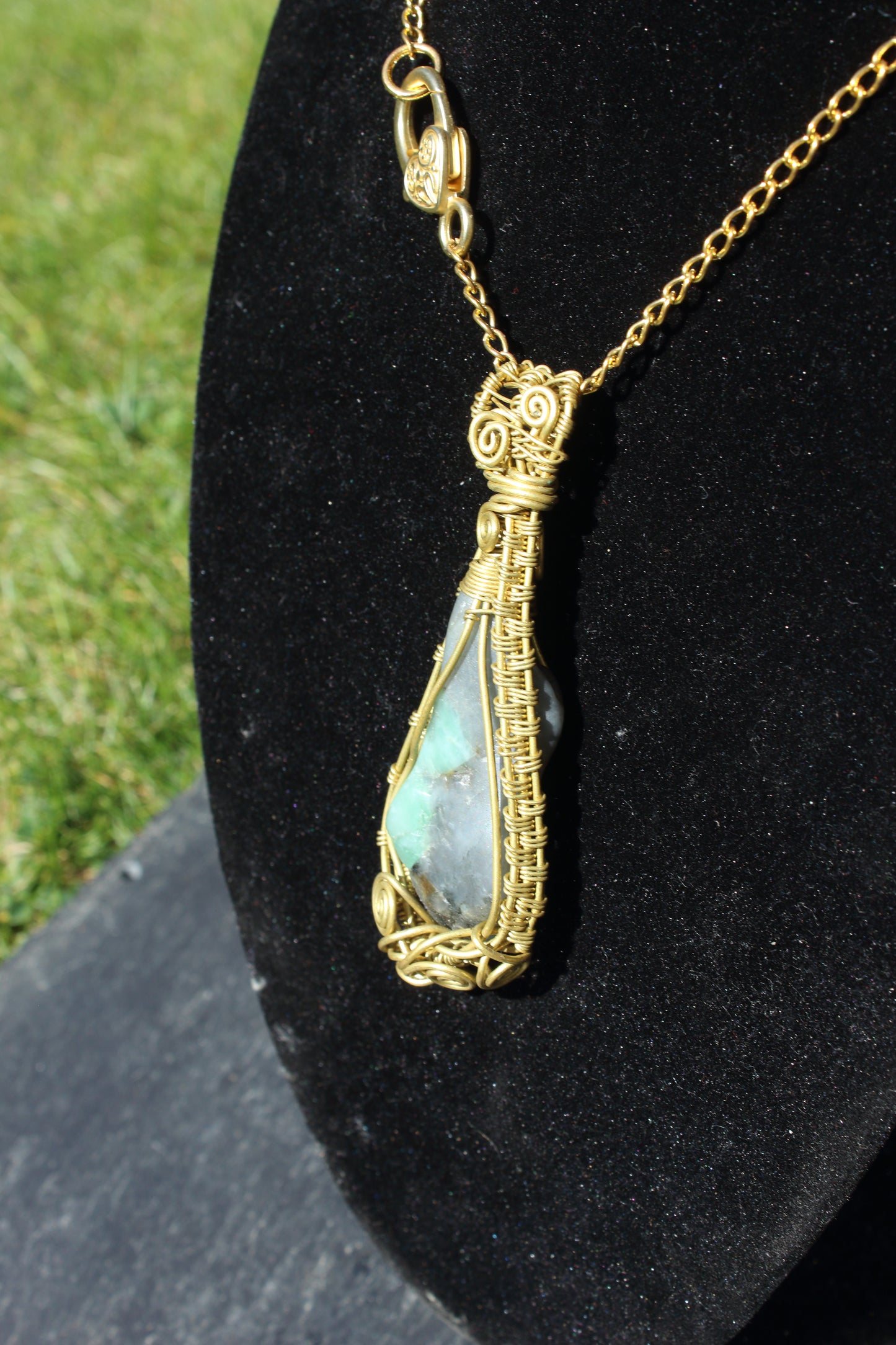 Sleek emerald matrix pendant