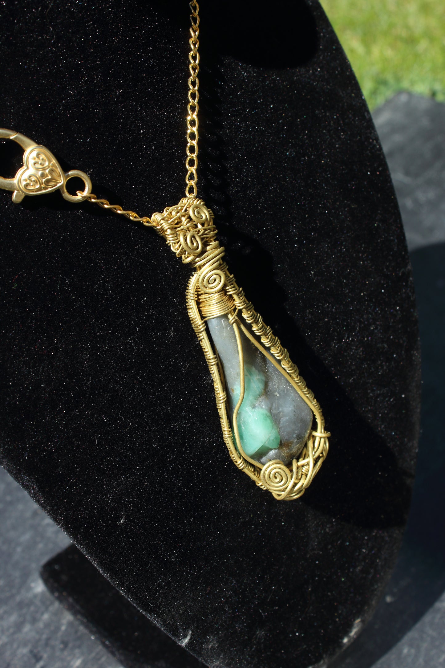 Sleek emerald matrix pendant
