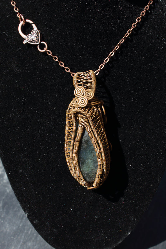 Dark labradorite amulet