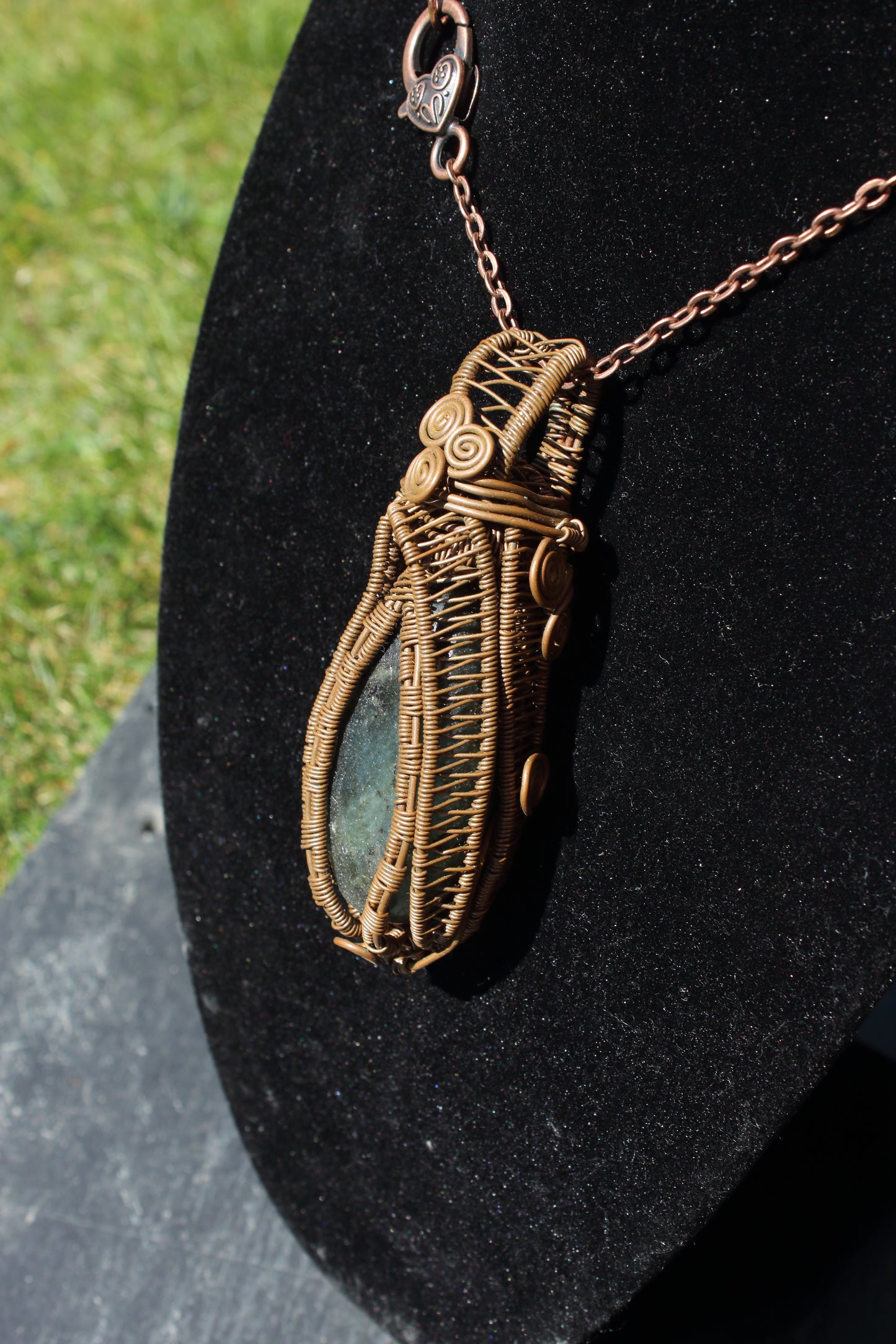 Dark labradorite amulet