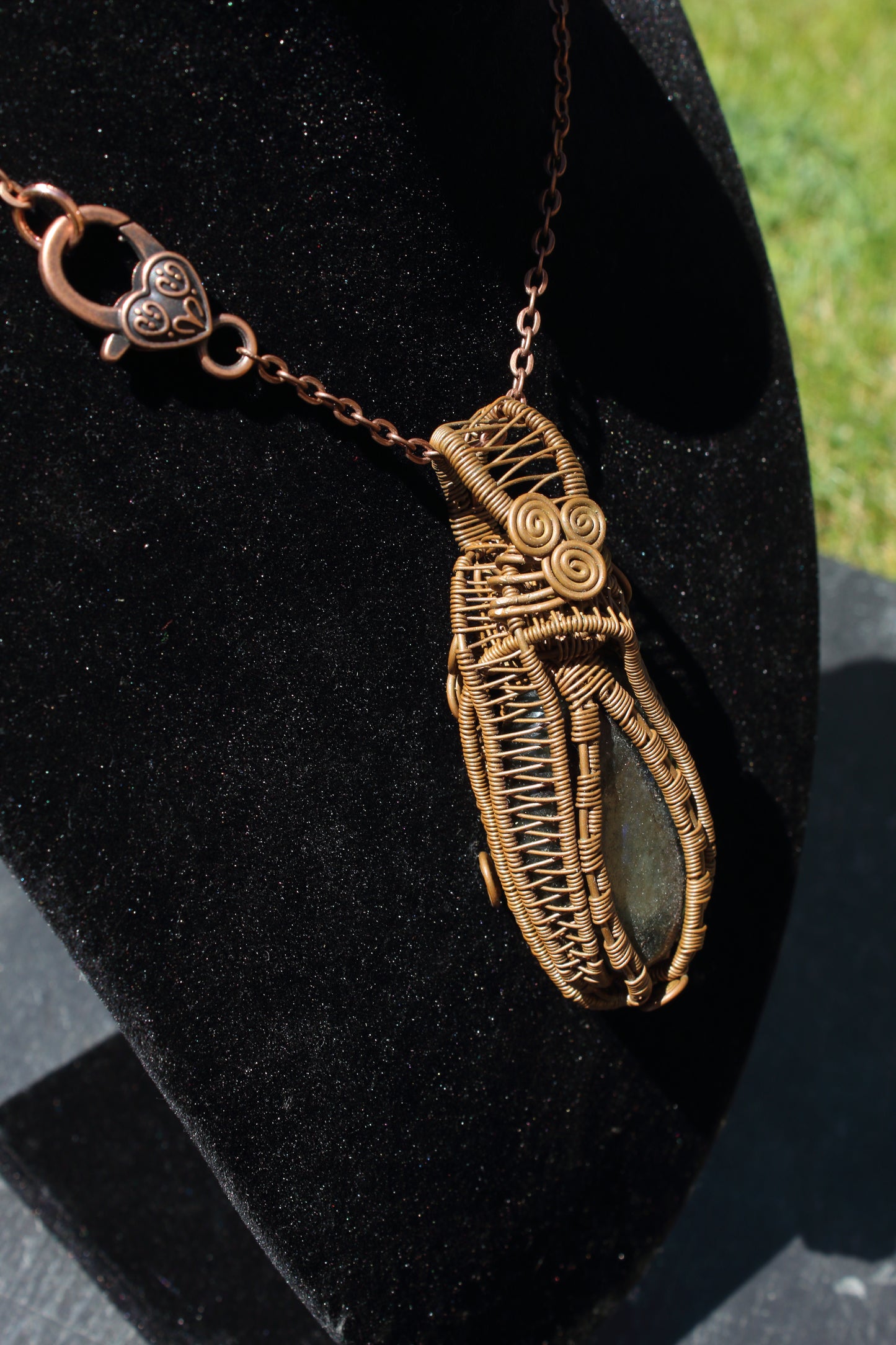 Dark labradorite amulet